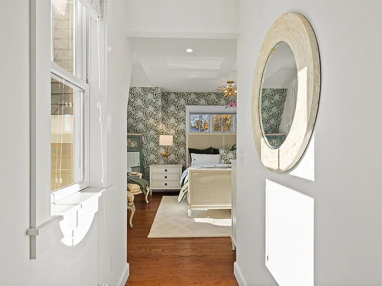 South-facing. Uniquely private master suite shares no walls with other rooms and has windows on three sides. Cali King bed, 2 large nightstands, large dresser, all from RH. Flatscreen. Serena and Lily wallpaper and bedding. Blackout curtains on 2 windows