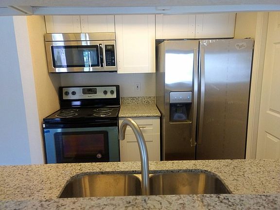 Stainless steel appliances side by side refrigerator