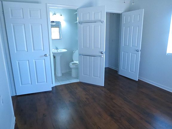 Master bedroom with full bath and closet. Brand new wood floors. Balcony off main.