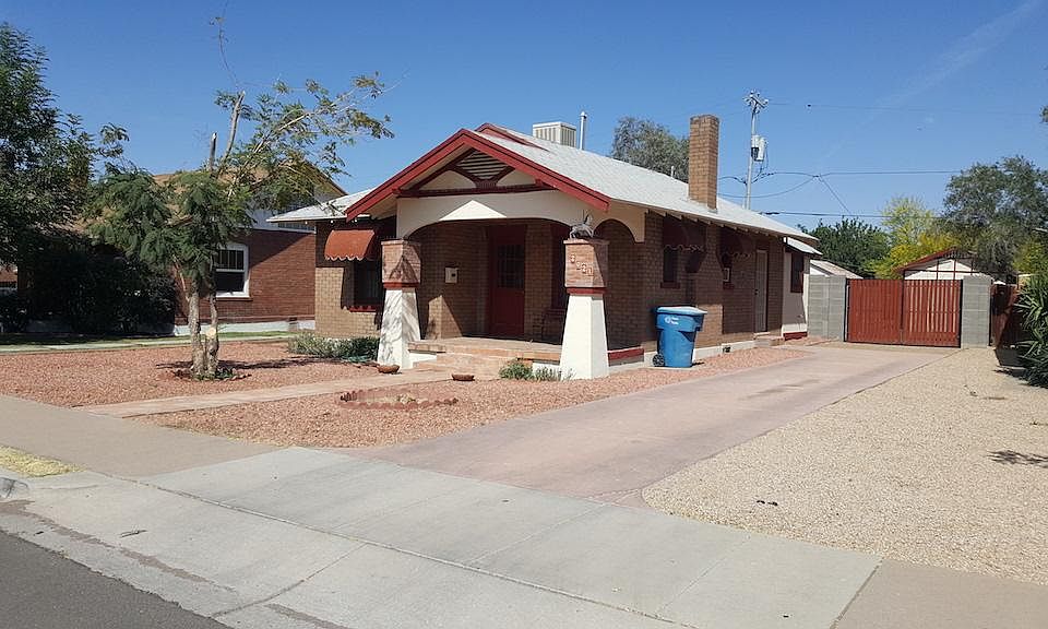 View of front and side of house, long driveway, nice porch -