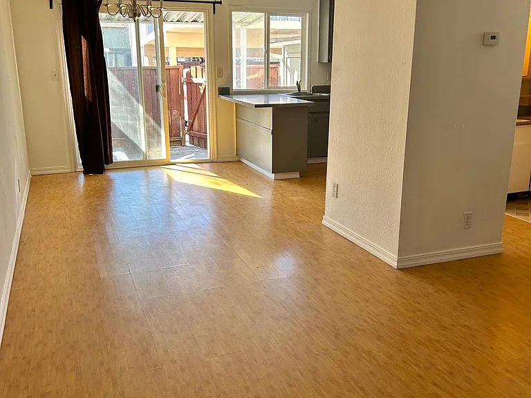 1st floor includes kitchen, dining area, living room, and 1/2 bathroom, with connected patio.