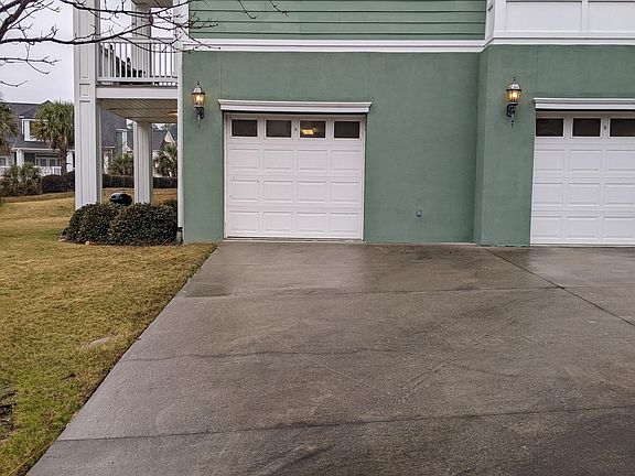 Garage has automatic door opener. Ther is also a private storage room in the garage area.