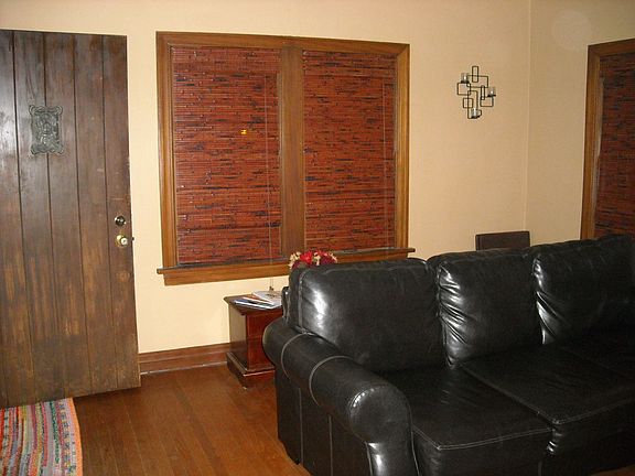 Living Area with Original Front Door Open