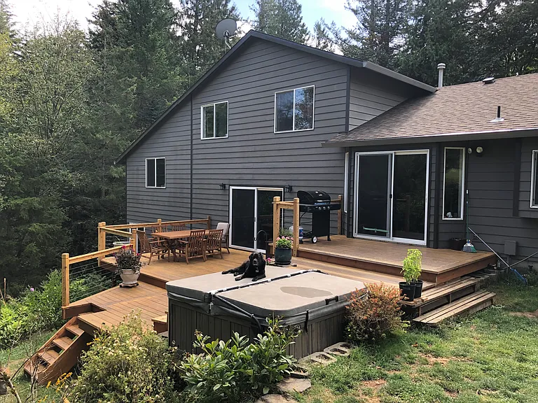 New deck built 2023 and hot tub. Friendliest dog on the planet not included ;)