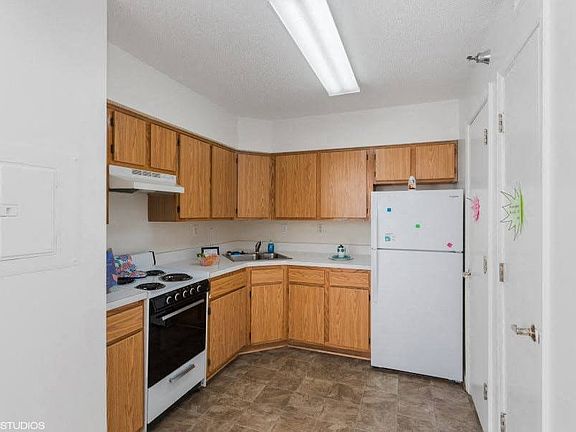 Lovely kitchen with rich wood cabinetry
