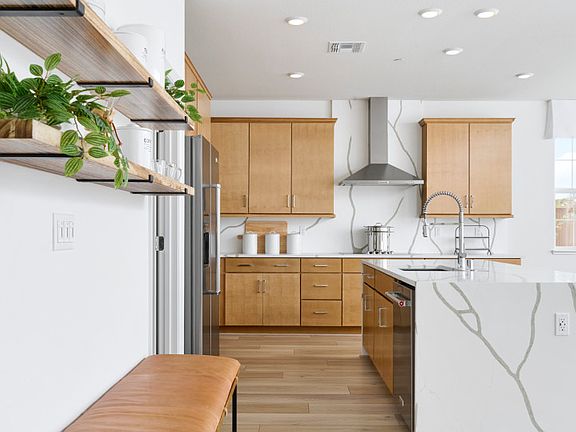 Sunlit kitchen with plenty of storage