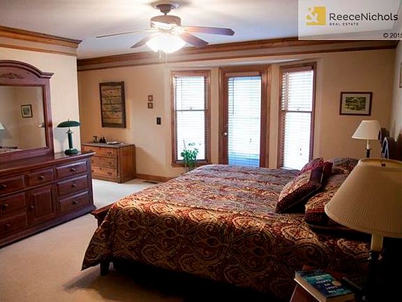 Elegant, Large Master Bedroom.  Exits Onto Rear Deck