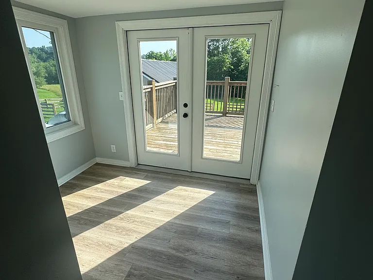 rear room, off the kitchen that leads to the deck