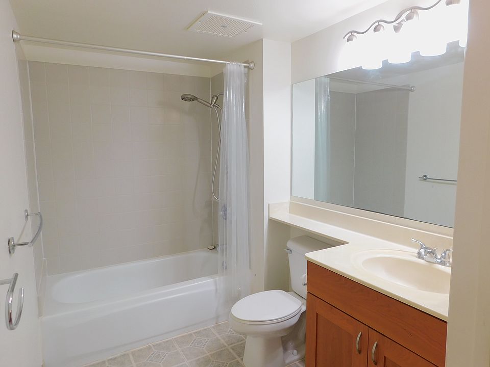 Guest bathroom with full bathtub.