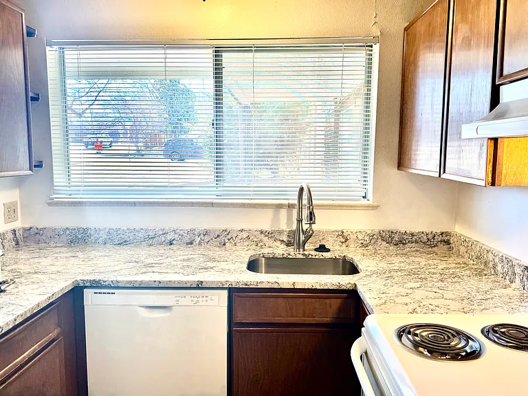 Newly up-graded kitchen with new granite counters, faucets etc.