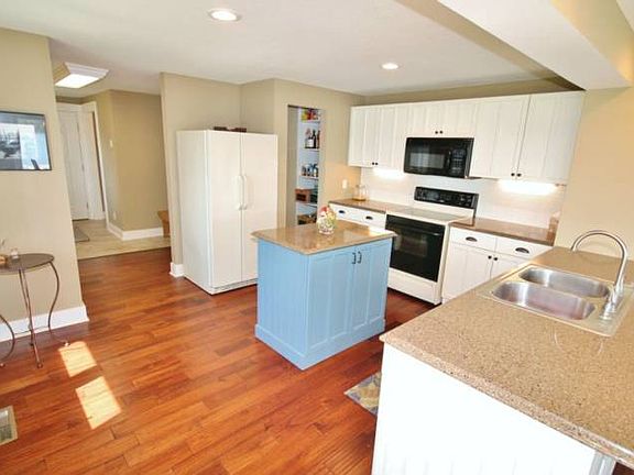 You can never have too much storage and the kitchen island provides not only storage but is movable as well. 