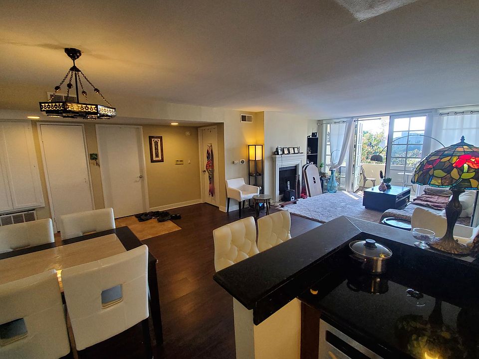 View of living room from kitchen. Dishwasher.