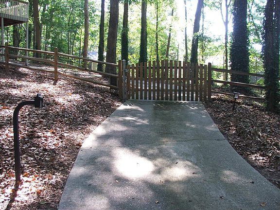 Gated backyard with electric gate