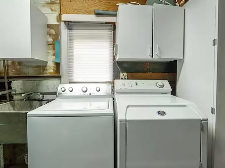 Convenient on-site laundry area with washer and dryer, making longer stays and beach days easy and stress-free. Ideal for keeping towels, swimwear, and everyday essentials fresh during your stay.