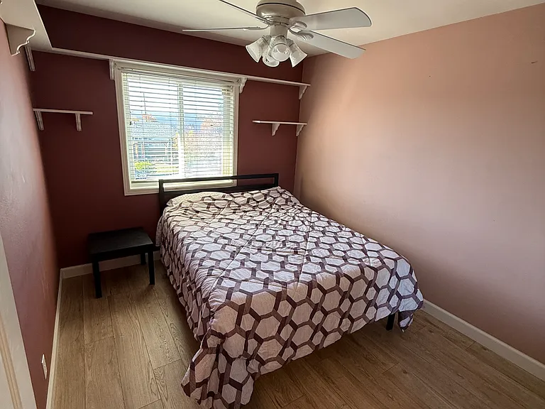 Bedroom 2 with mirror reach-in closet.