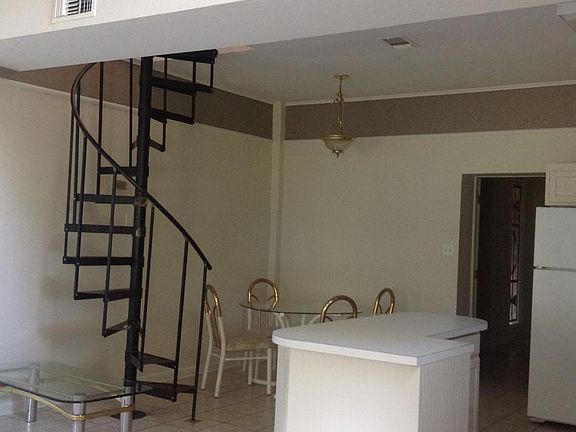 Circular Stairway and Dining Area