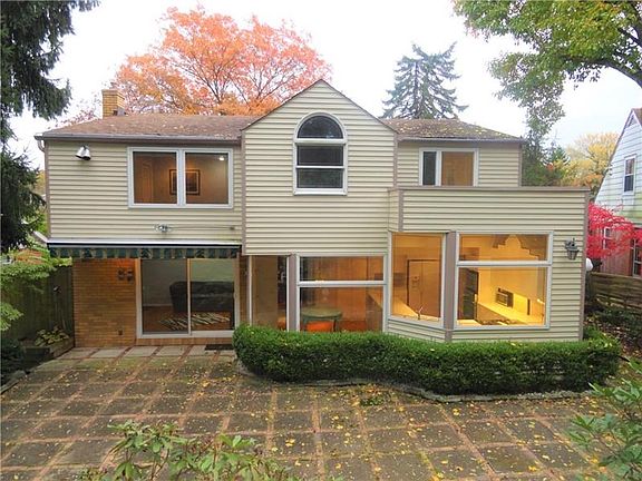 Welcome to 38 Barton Drive in Churchill.  The past renovation consisted of a two story addition which transformed this Cape Cod 