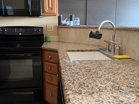 3rd image of W401-3930 S Roosevelt Blvd