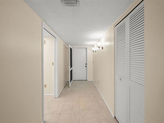 5th image of 7860 PALM AIRE LANE #105