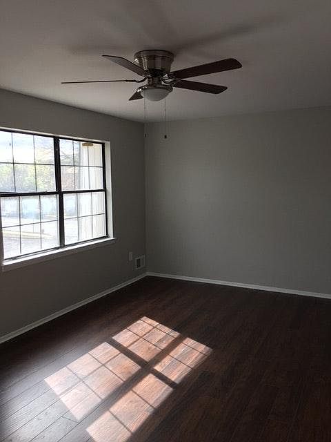 Bedroom 1 - Large Windows with Fan and Light