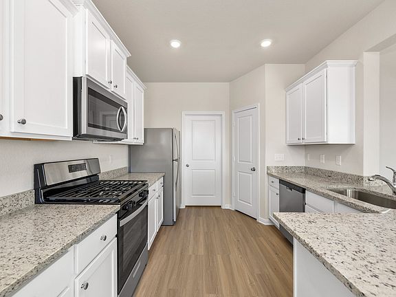 Enjoy a full suite of appliances by Whirlpool in this move-in ready home!