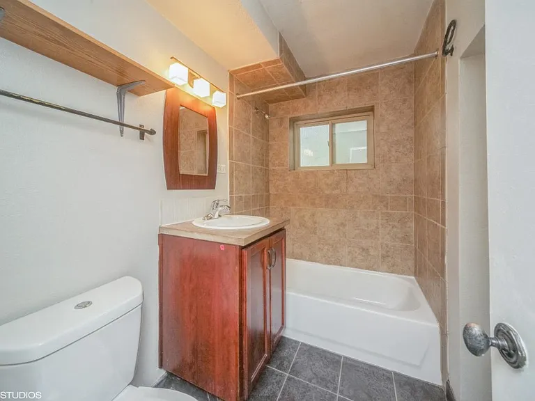 Bathroom with a full size tub
