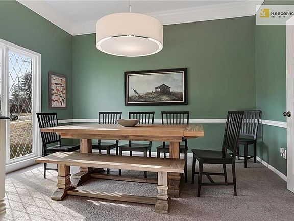 Formal dining room also boasts high ceilings and is a great place to entertain