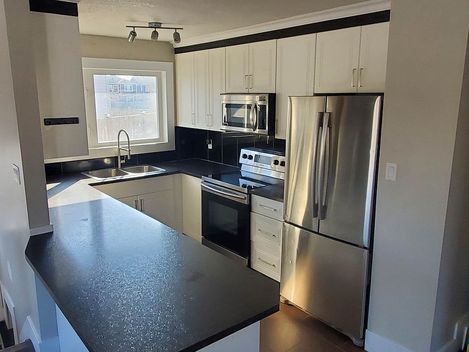 1st image of 11411 149th Ave NW #11411