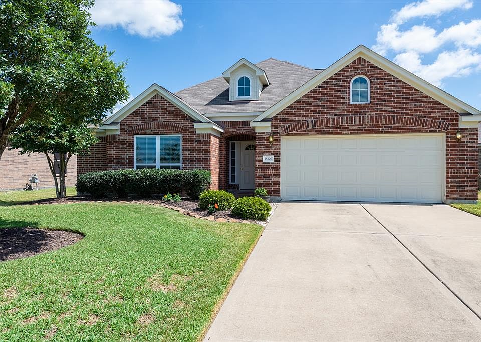Welcome Home! This 1.5 story home located in the Village of Cypress Lakes. Just walk out the front door and see the amazing amenities.