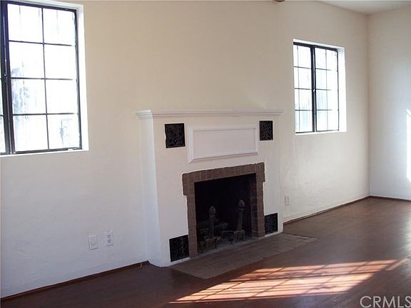 Wood burning fireplace in living room