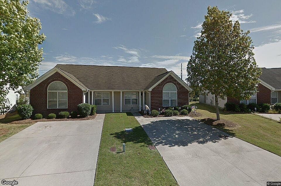 121 Unit on right with tree