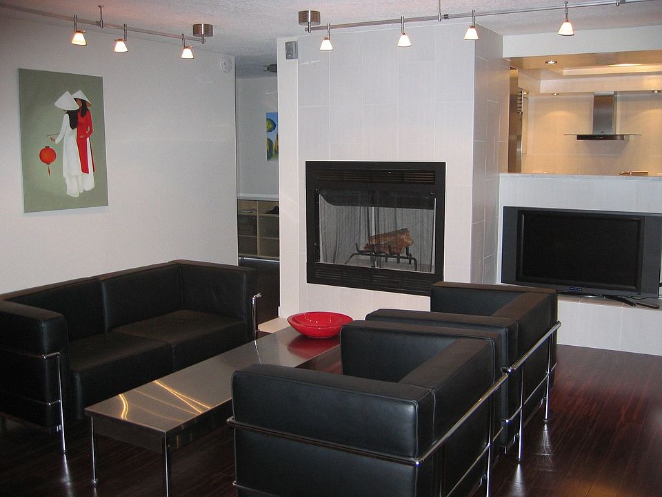 Living room with wood burning fireplace
