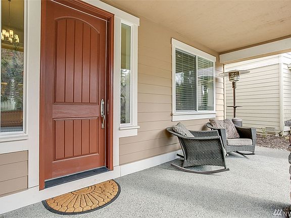 Such a delightful approach greets you at this home. A spacious covered front porch is a welcoming space to relax! Both floors boast perfect opportunities for guest suites--the main floor has a bedroom, which could also be a den/office, adjacent to a 3/4 bath; and upstairs you'll find one of the bedrooms has a private ensuite bath of its own! Located in one of Fairwood's most sought-after neighborhoods, enjoy well-maintained homes and a tranquil setting with a playground just two doors down. Enjoy award-winning Kent schools and convenient access to freeways, hospital, major dining and retail hubs.
