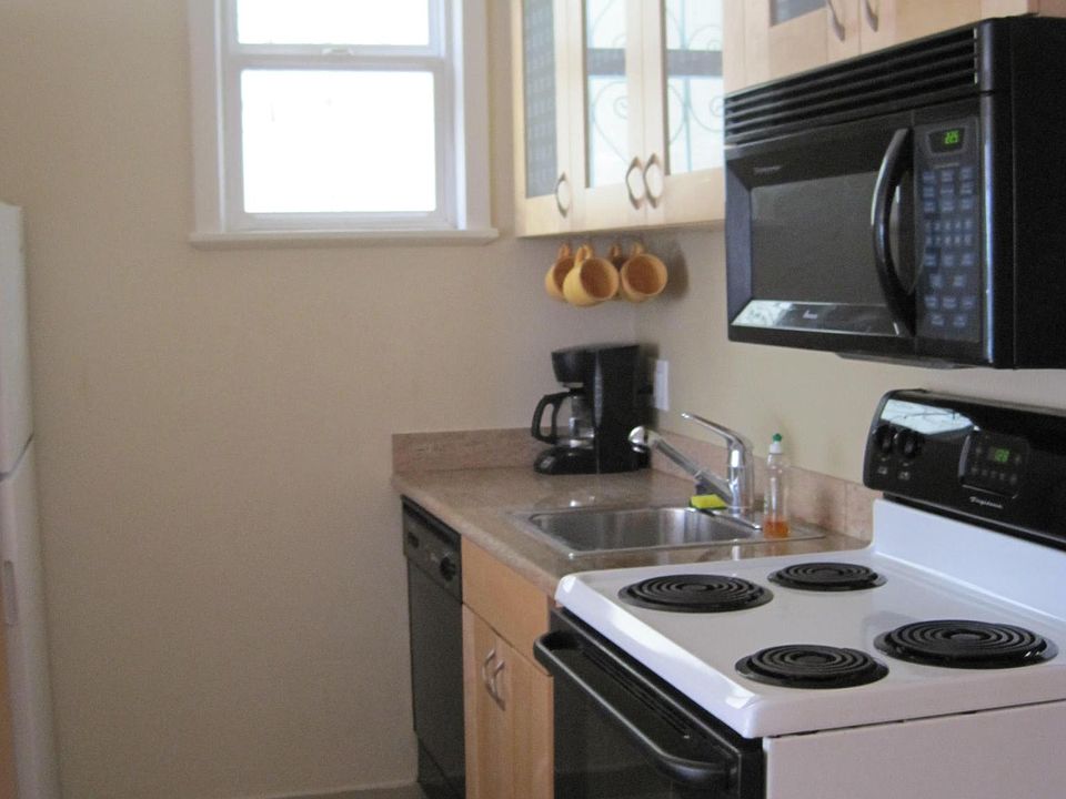 Old kitchen photo - appliances have been updated.