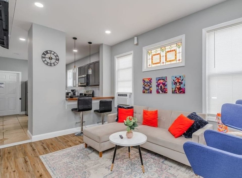 Open living/kitchen area with breakfast bar