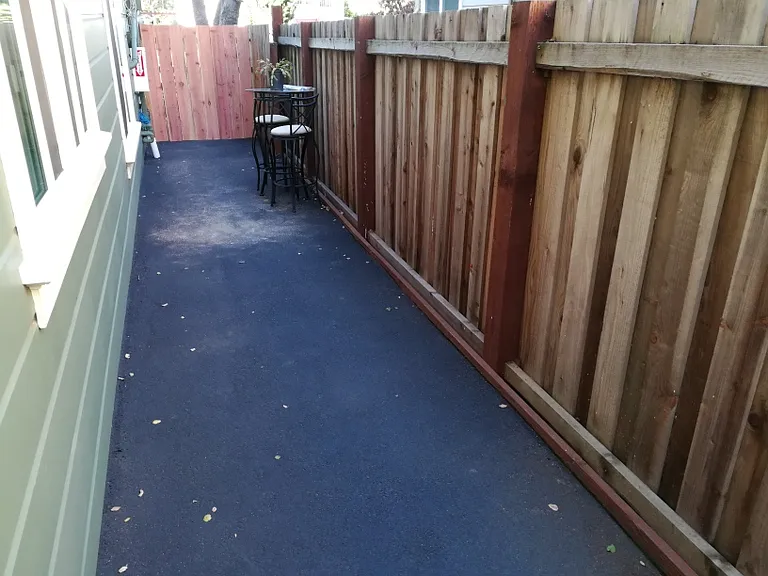 Your private side-yard, where you can decorate, furnish and relax outside. Also, viewable from your living room