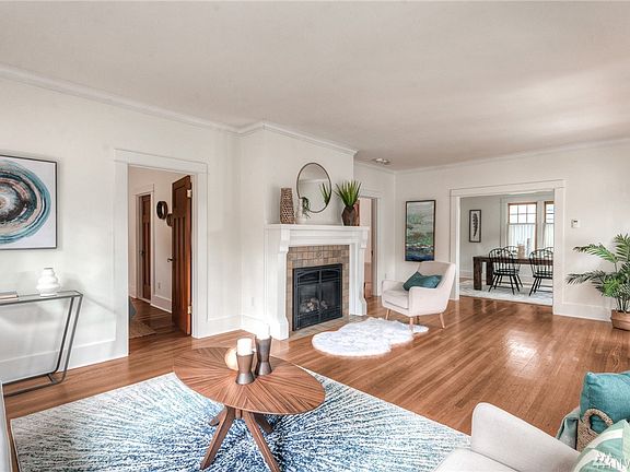 Living and dining- the fireplace is flanked on both sides by bedrooms, separated by a Jack and Jill bath