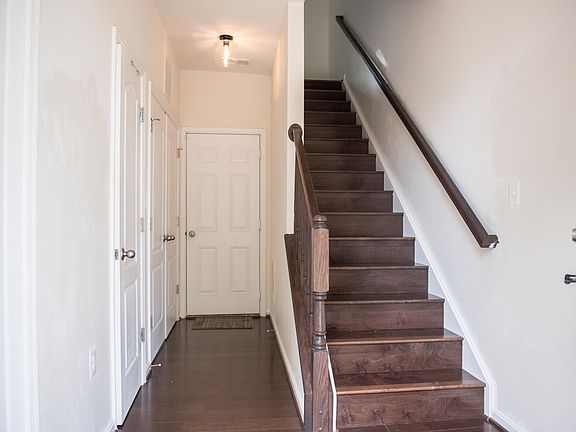 Front door entrance - garage, laundry room, and guest bedroom with ensuite bathroom on this level