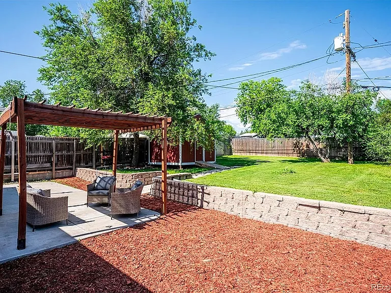 Backyard with pergola and shed