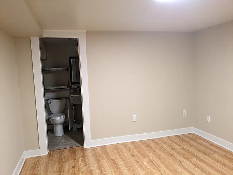 Downstairs bedroom and bathroom entrance.