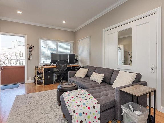 Living room looking back towards entryway