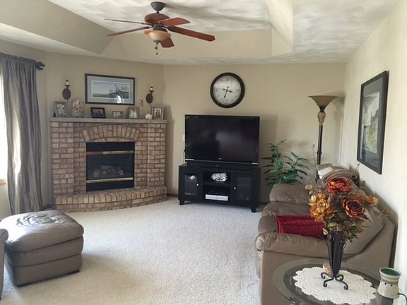 Living room w/ trey ceiling