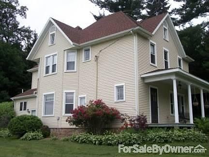 Large garage with heated shop + 200 amp
						:
						Double garage doors in the front, between main part and shop and out the back
