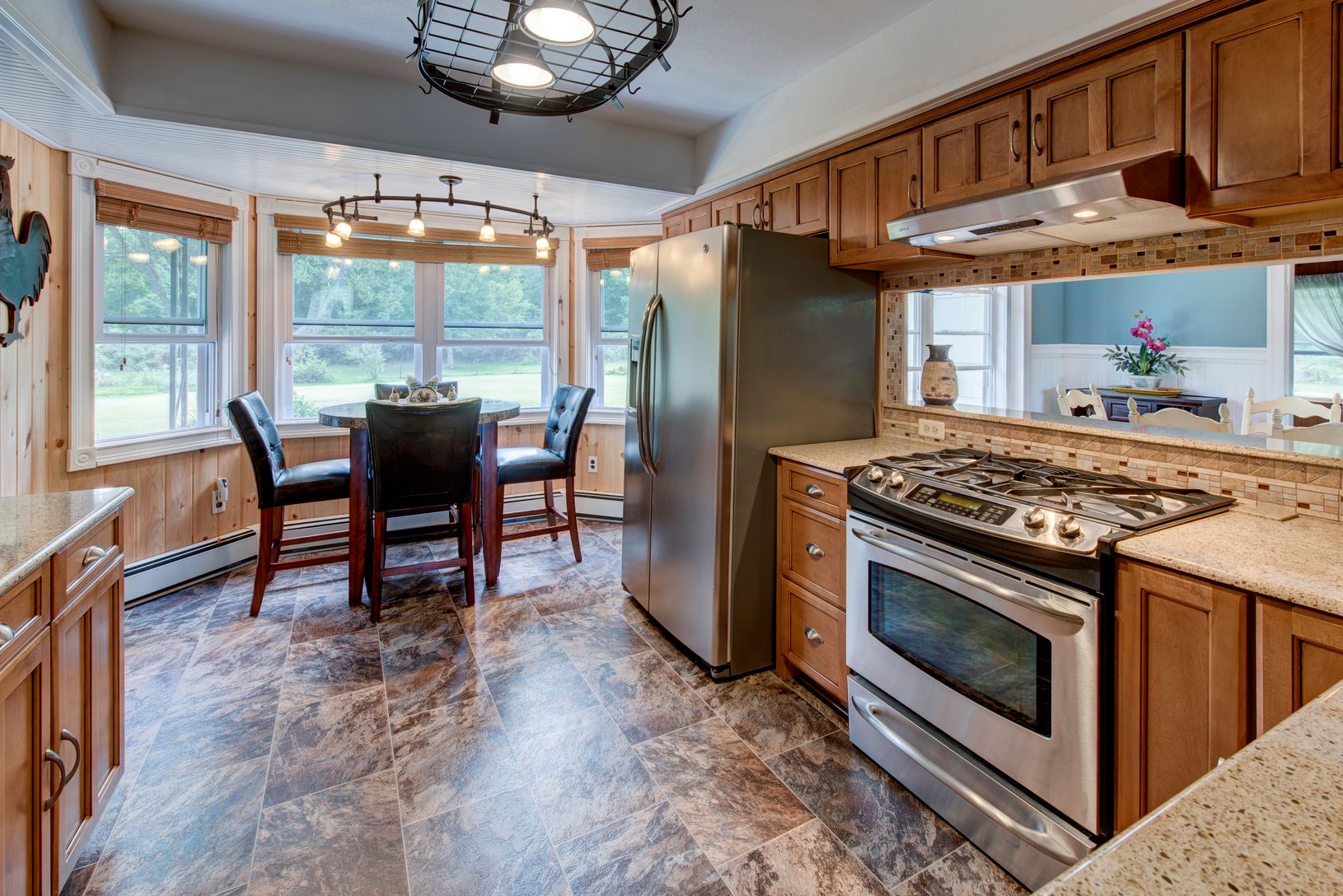  Eat in kitchen with granite counters and stainless steel appliances
