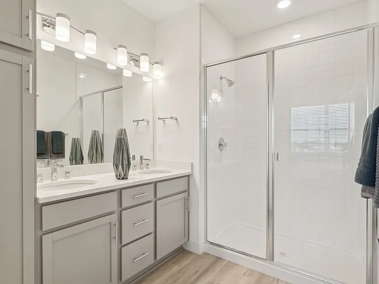 Primary private bath: Double vanity, storage