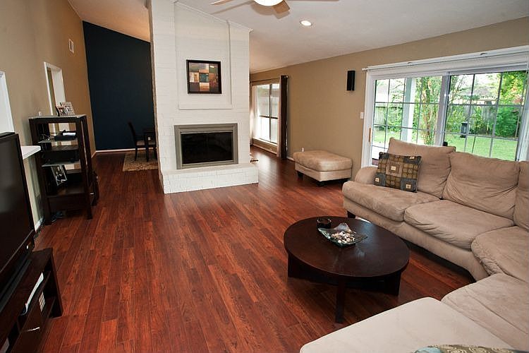 Den with wood laminate