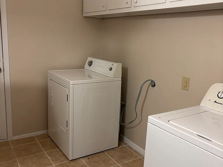 Laundry room with washer and dryer