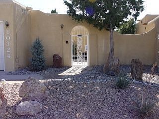 Front View enter into walled courtyard