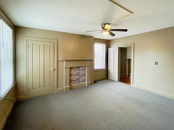 Living Room/3 windows & a closet.
