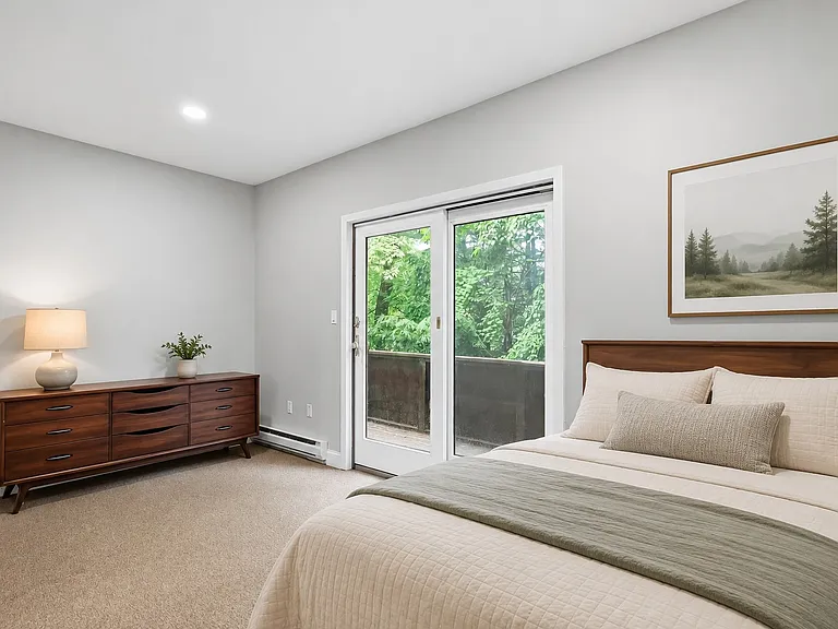 Virtually staged bedroom on lower level